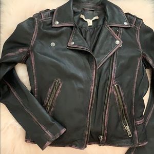I am selling a never worn leather jacket.